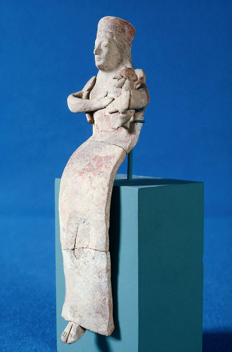 Goddess kourotrophos seated