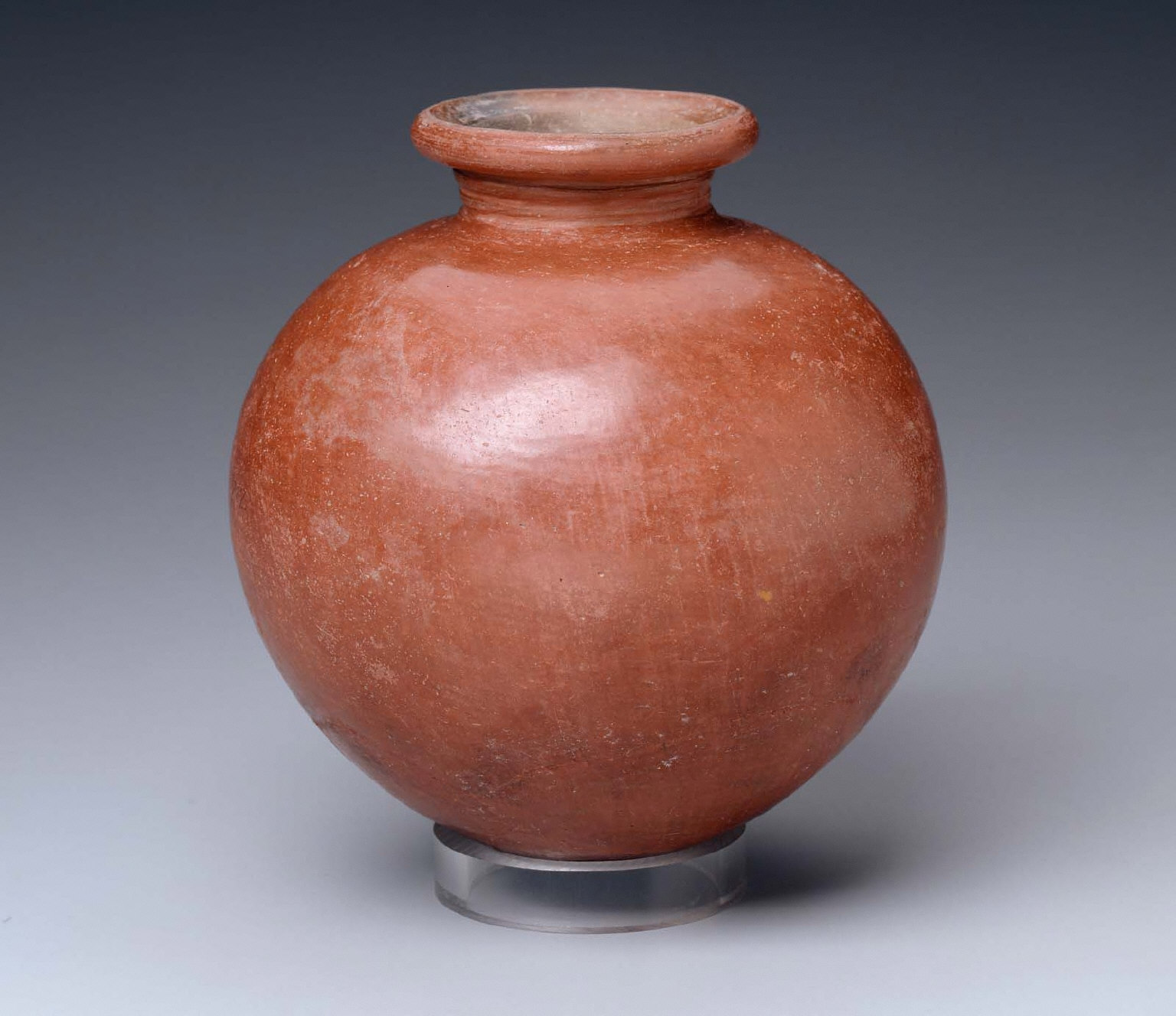 Red-polished vase with rilled neck