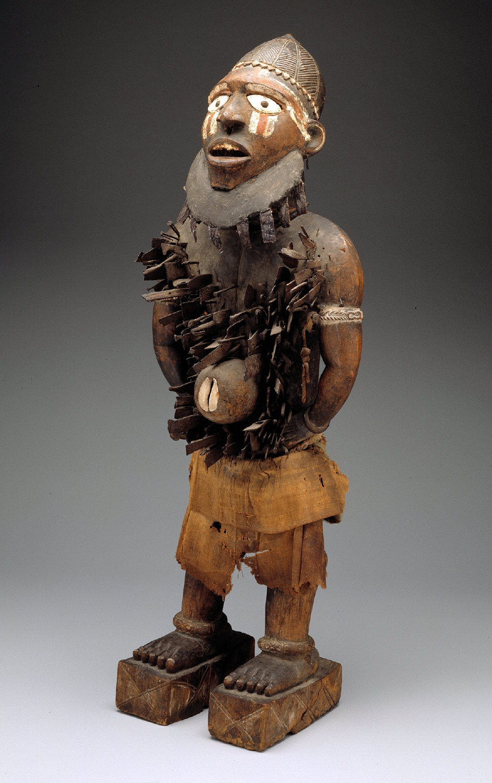 Standing male figure with nails (Nkisi Nkonde)