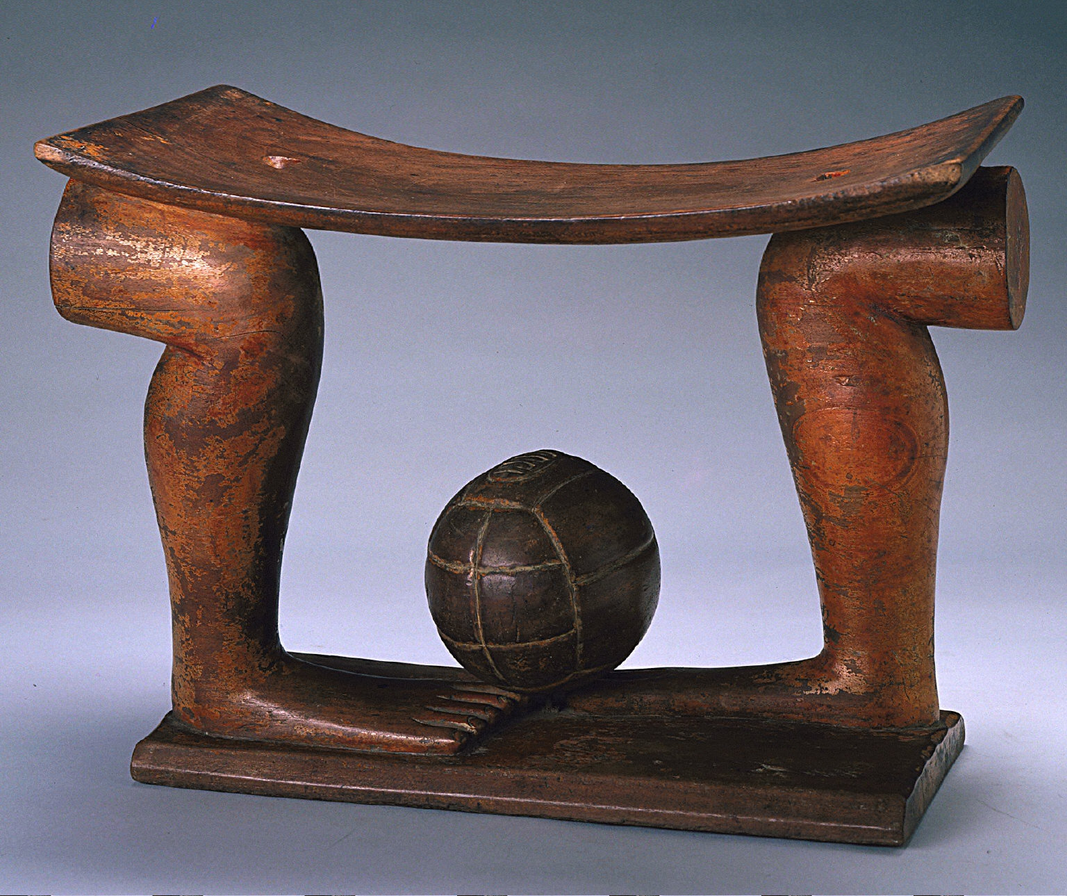 Stool with Two Legs and Spinning Soccer Ball